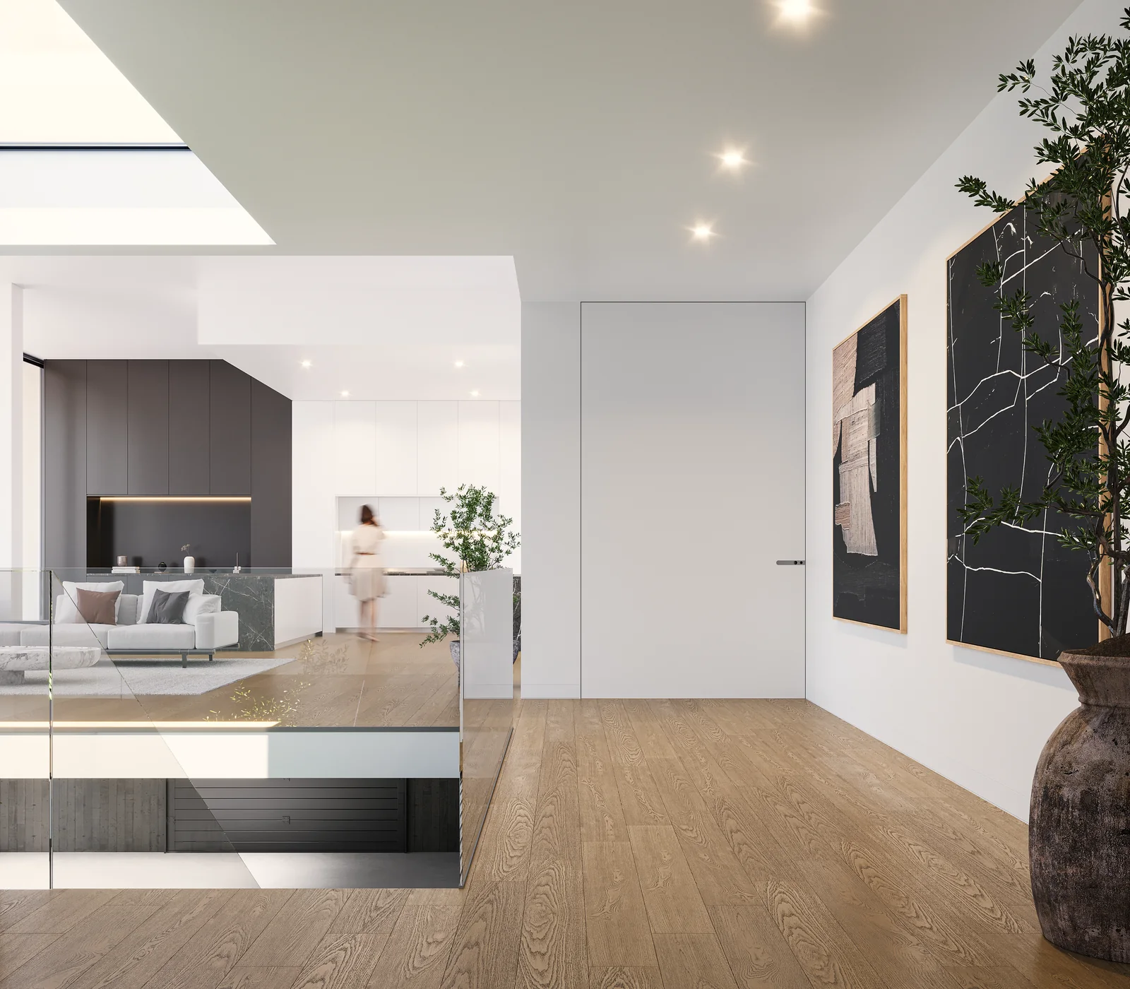 An entrance hall opening sideways into a living space, with a tall vase and a low console.