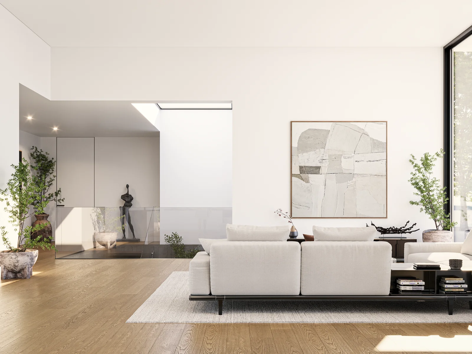 A living room with pale sofas, oak floor and a full-height glazed wall onto a garden.