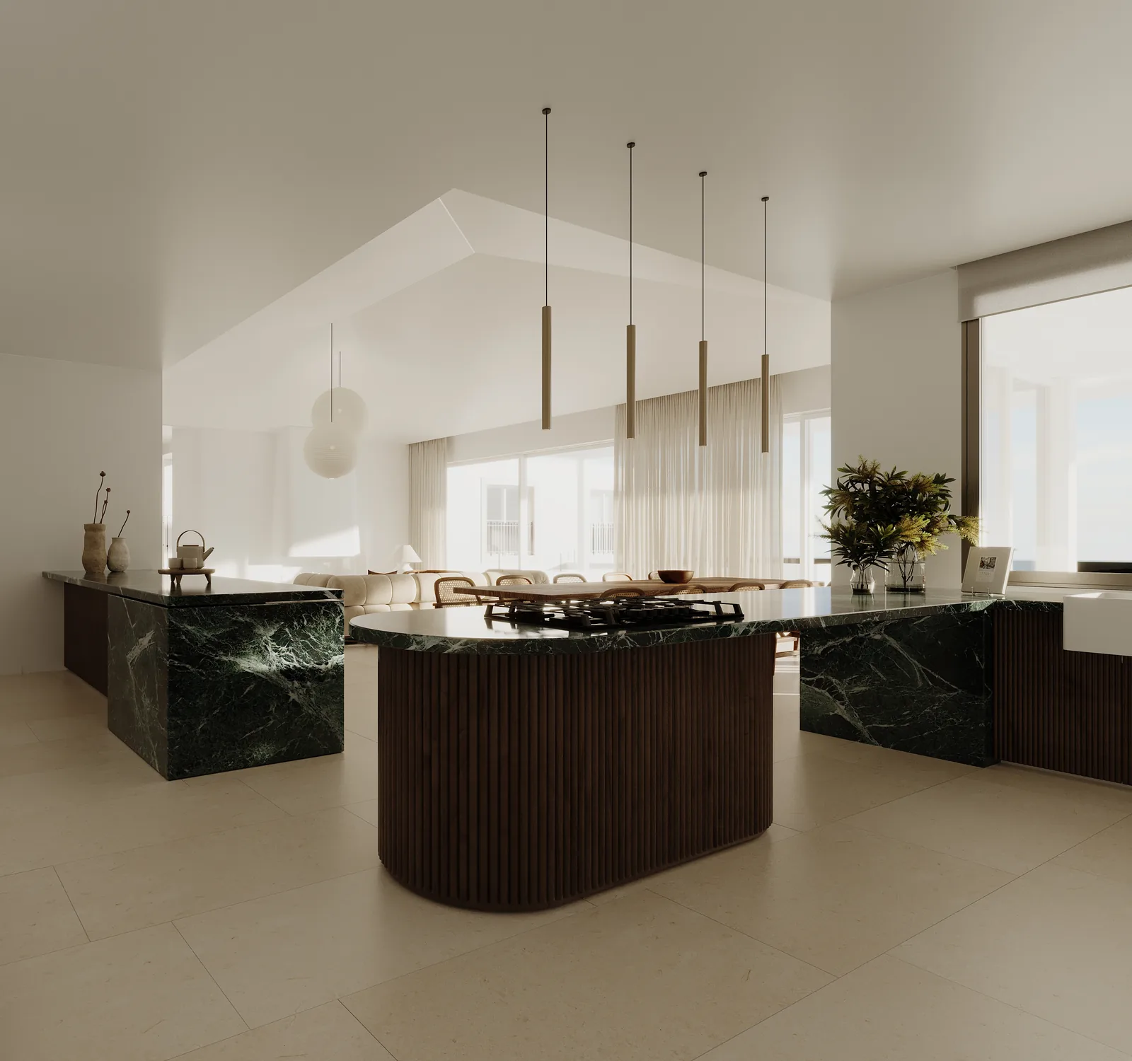 The kitchen: a fluted dark timber island against a green marble counter that returns up the wall, slim pendant lights in a row above and a dining table beyond under a pitched white ceiling.