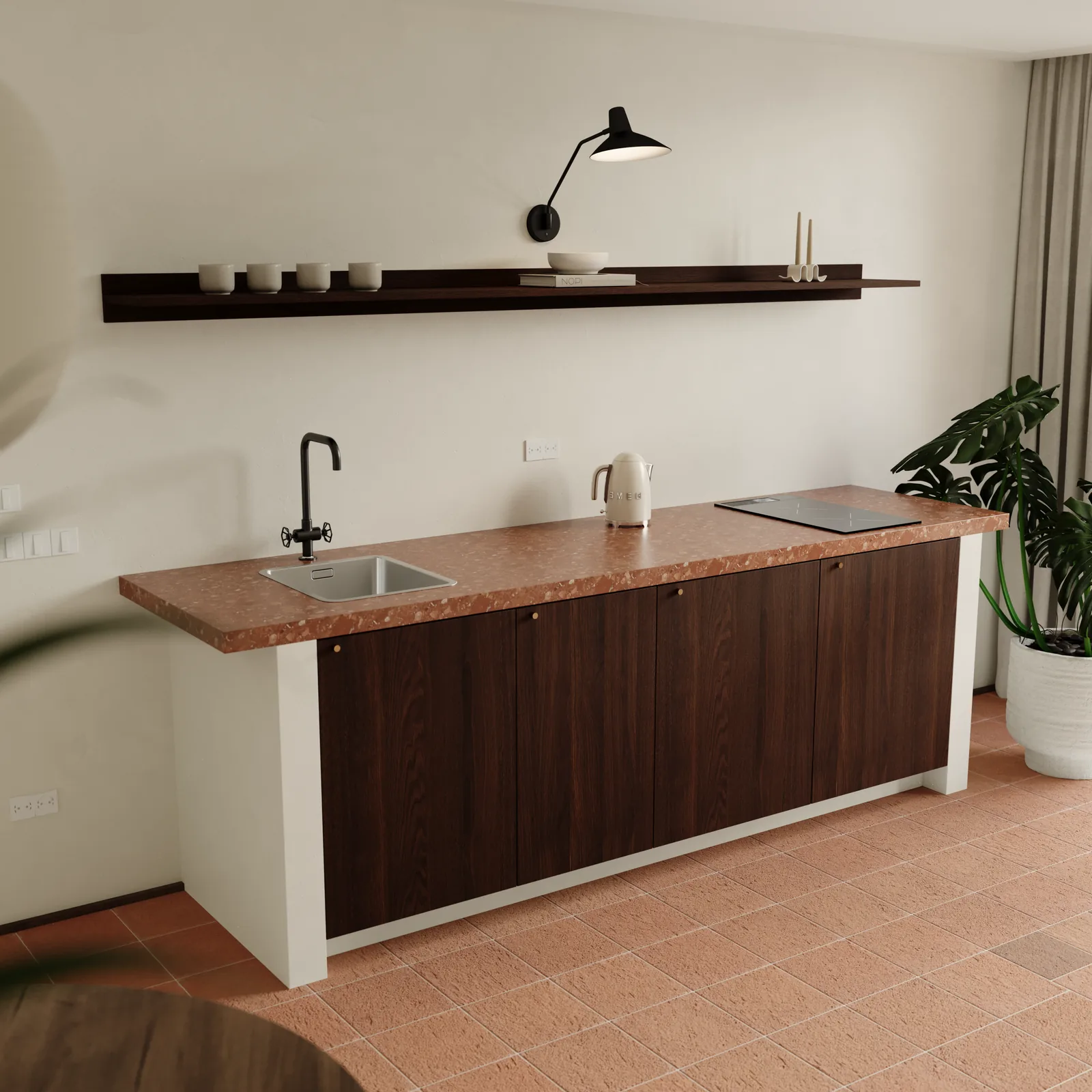 Close view of the kitchen block: a dark wood counter with an integrated hob and sink, a slim shelf above holding a lamp and a few objects, and a checkerboard tile strip in the floor alongside.