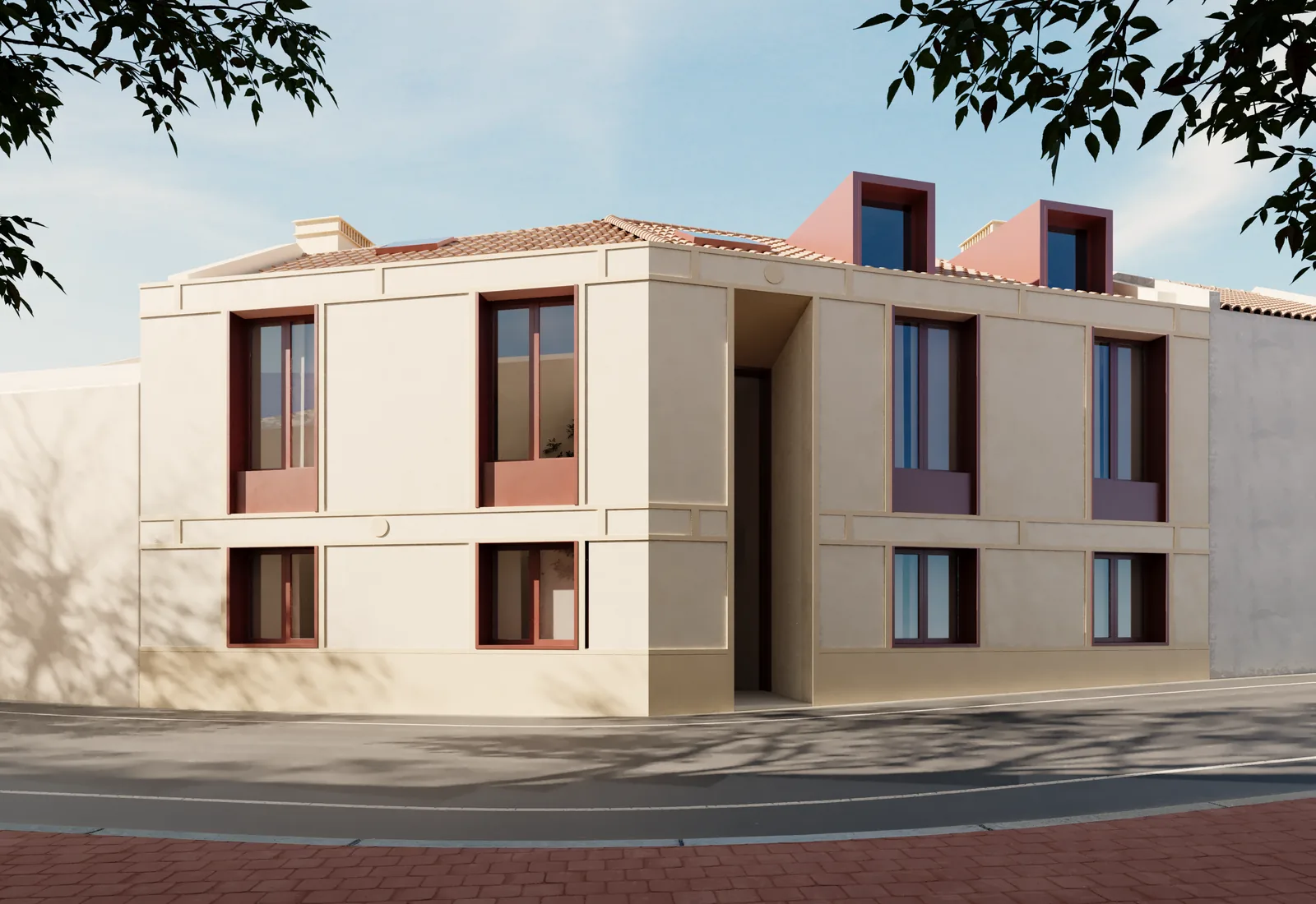 The corner of the block from the street: a rendered three-storey elevation with regularly spaced windows in oxblood frames, a recessed shopfront at ground level and neighbouring buildings on either side.
