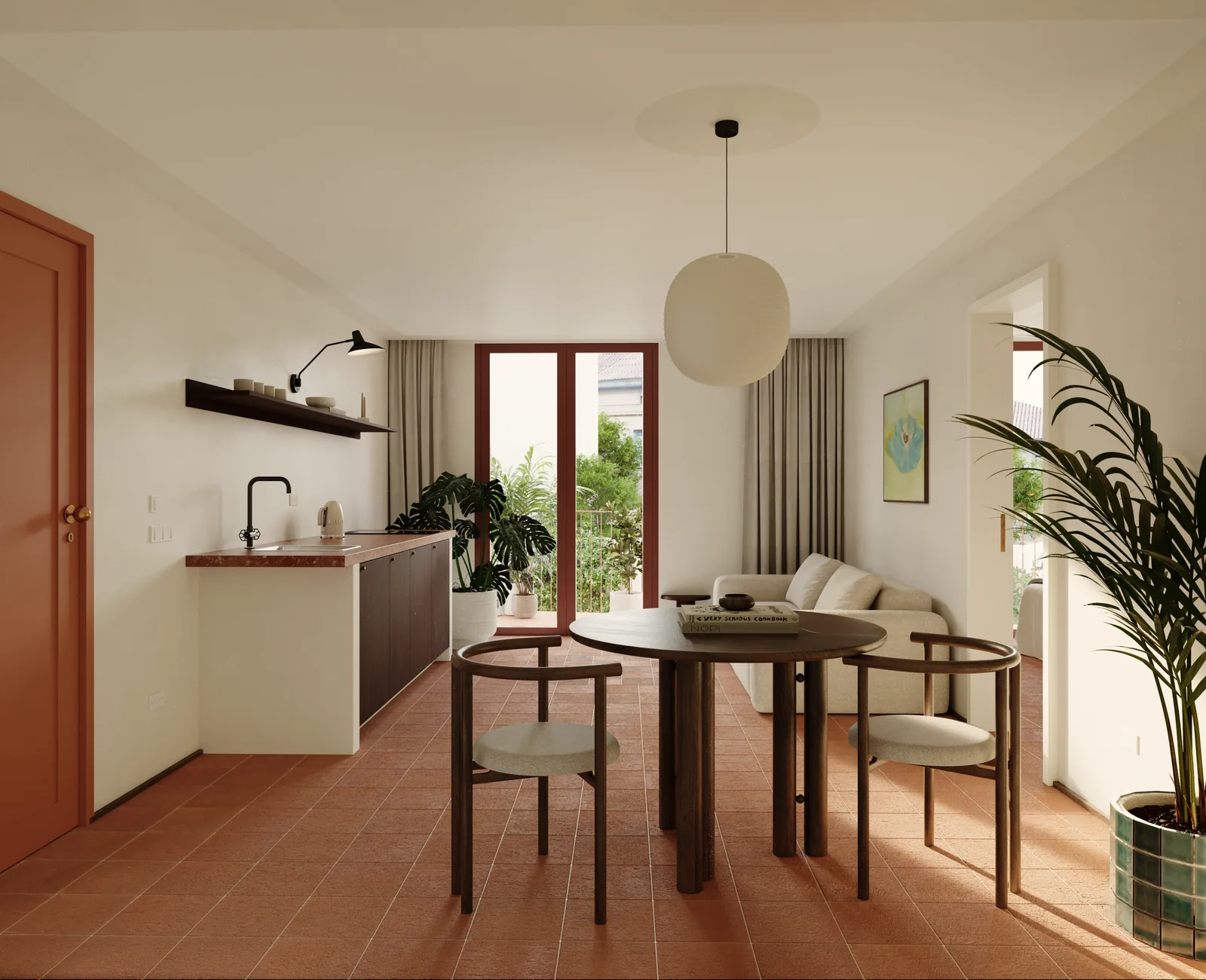 A one-bedroom apartment: kitchen counter in dark wood on the left, a round dining table with four chairs, a paper pendant, and a glazed door to the courtyard behind a large plant.