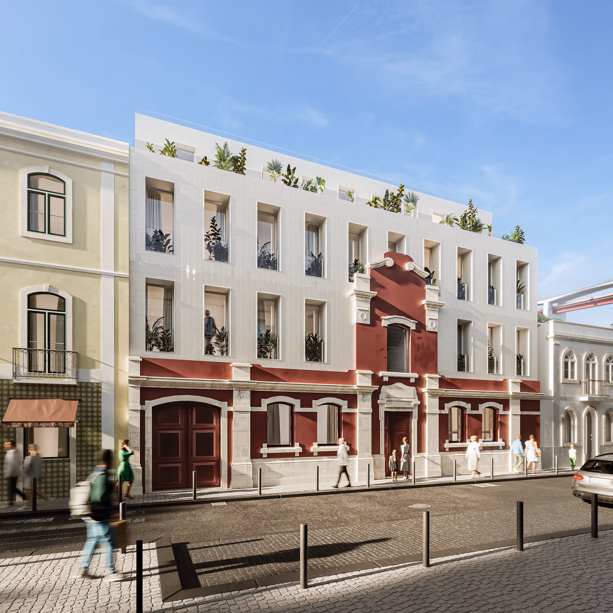Restored heritage Lisbon building with a white and oxblood facade, ornate carved-stone window surrounds and a rooftop garden on a cobbled street, by WALLNUT.